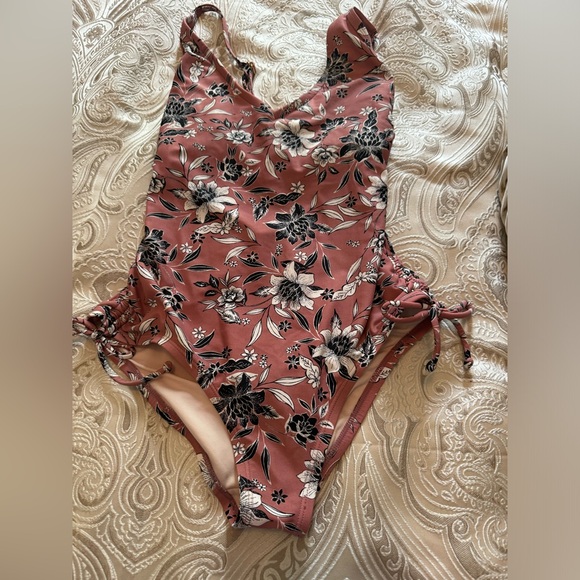 Kona Sol pink one piece bathing suit with black and white floral pattern. - Picture 1 of 7
